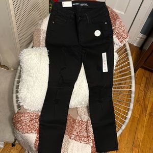 Black jeans, ripped, new with tags.